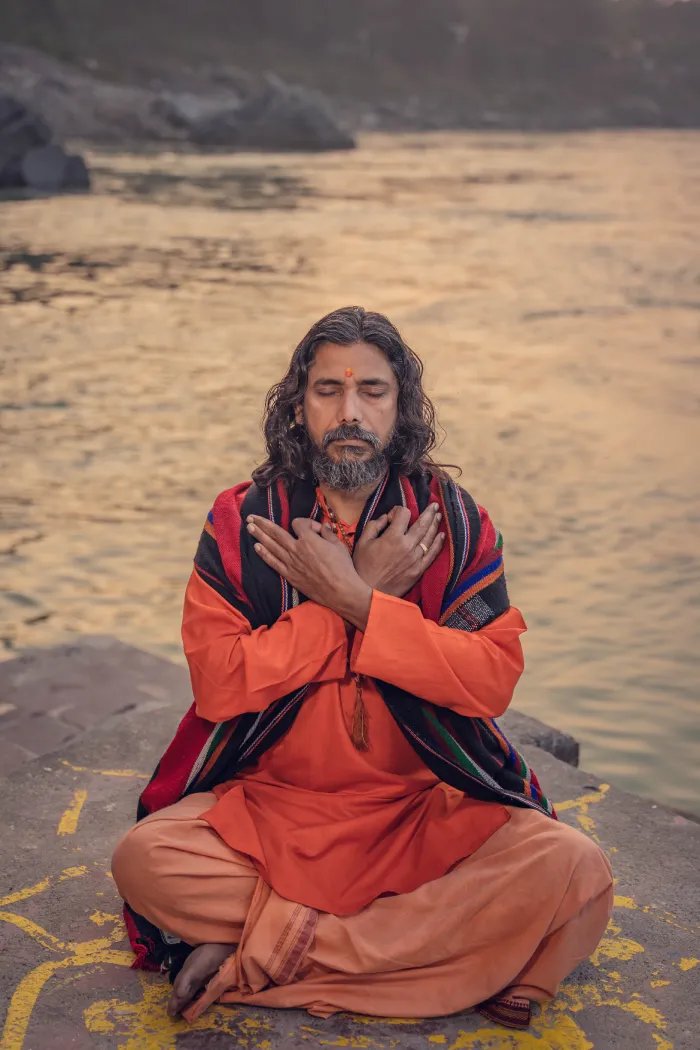 meditation in the bank of ganga river