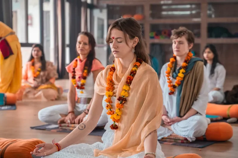 Students practicing yoga at Vinyasa Yoga Academy Kerala